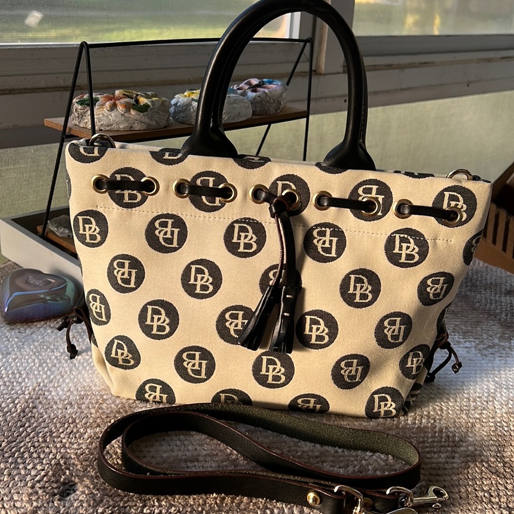 Dooney & Bourke cream color with long strap